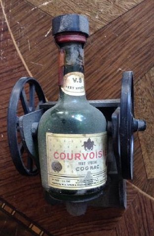 Courvoisier Cannon Bottle: Any contents in bottle is Free; You are bidding on the bottle