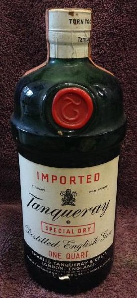 Tanqueray: Distilled English Gin 1 quart: Any contents in bottle is Free; You are bidding on the bottle