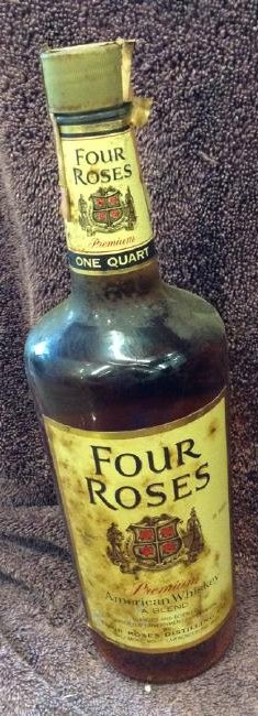 Four Roses Premium American Whiskey one quart: Any contents in bottle is Free; You are bidding on the bottle