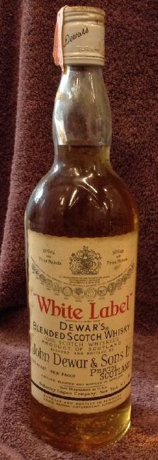White Label Dewar's Blended Scotch Whiskey 4/5 quart: Any contents in bottle is Free; You are bidding on the bottle