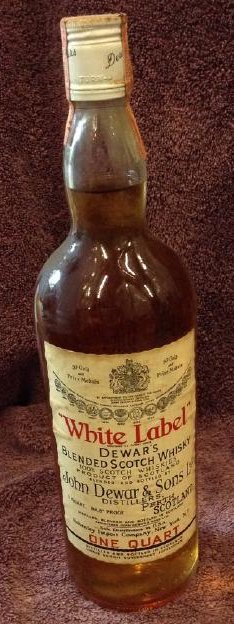 White Label Dewar's Blended Scotch Whiskey one quart: Any contents in bottle is Free; You are bidding on the bottle