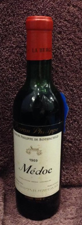 1969 Baron Philippe Me' doc 12 fl oz.: Any contents in bottle is Free; You are bidding on the bottle