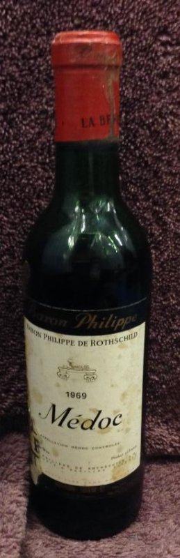 1969 Baron Philippe Me' doc 12 fl oz.: Any contents in bottle is Free; You are bidding on the bottle