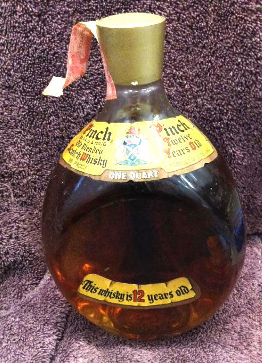 Pinch Old Blended Scoth Whiskey one quart: Any contents in bottle is Free; You are bidding on the bottle