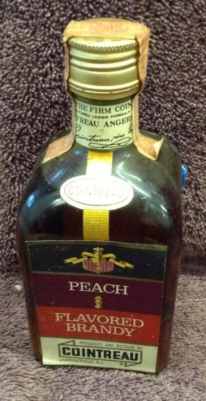 Cointreau peach flavored brandy 3/4 pint: Any contents in bottle is Free; You are bidding on the bottle