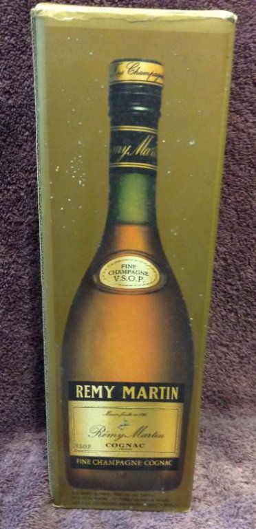 Re'my Martin Fine Champagne Cognac 4/5 quart: Any contents in bottle is Free; You are bidding on the bottle