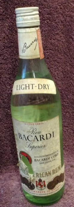 Silver Label Ron Bacardi Superior Puerto Rican Rum 4/5: Any contents in bottle is Free; You are bidding on the bottle