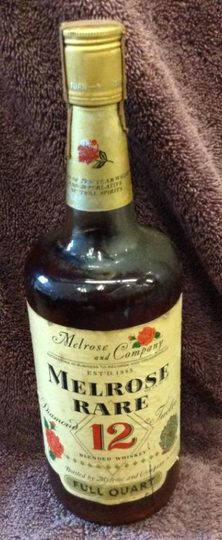 Melrose Rare Blended Whiskey full quart: Any contents in bottle is Free; You are bidding on the bottle