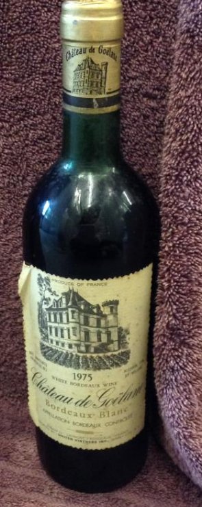 1975 Chateau de Goelane White 730ml: Any contents in bottle is Free; You are bidding on the bottle