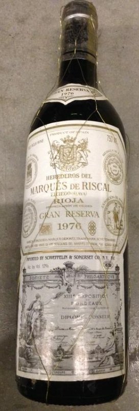 1976 Marque's de Riscal Rioja 750ml: Any contents in bottle is Free; You are bidding on the bottle