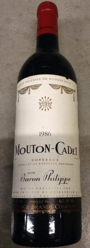 1986 Mouton - Cadet Baron Philippe 750ml: Any contents in bottle is Free; You are bidding on the bottle