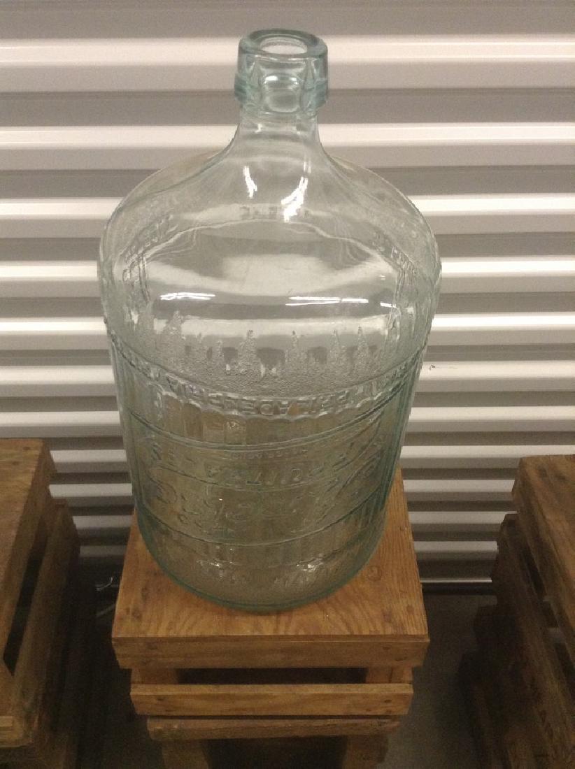 1926 Artic Fruitales 5 Gal. jug blue tint with wooden: 1926 Artic Fruitales 5 Gal. jug blue tint with wooden crate