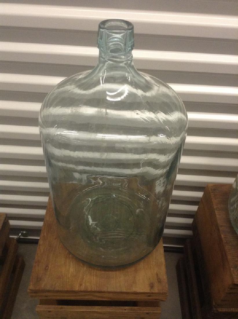 Blue tint 5 gallon glass jug electrified water compan: Blue tint 5 gallon glass jug electrified water compan with crate