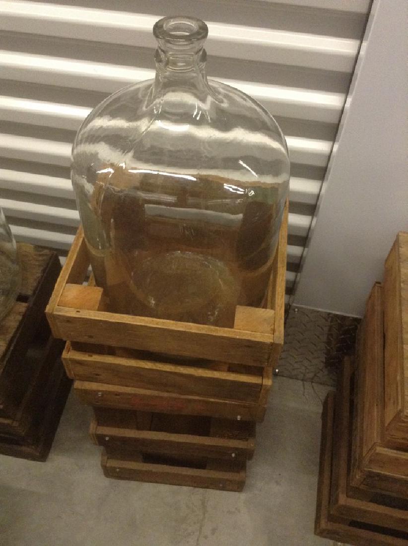 Clear glass 5 gallon water jug with crate: Clear glass 5 gallon water jug with crate
