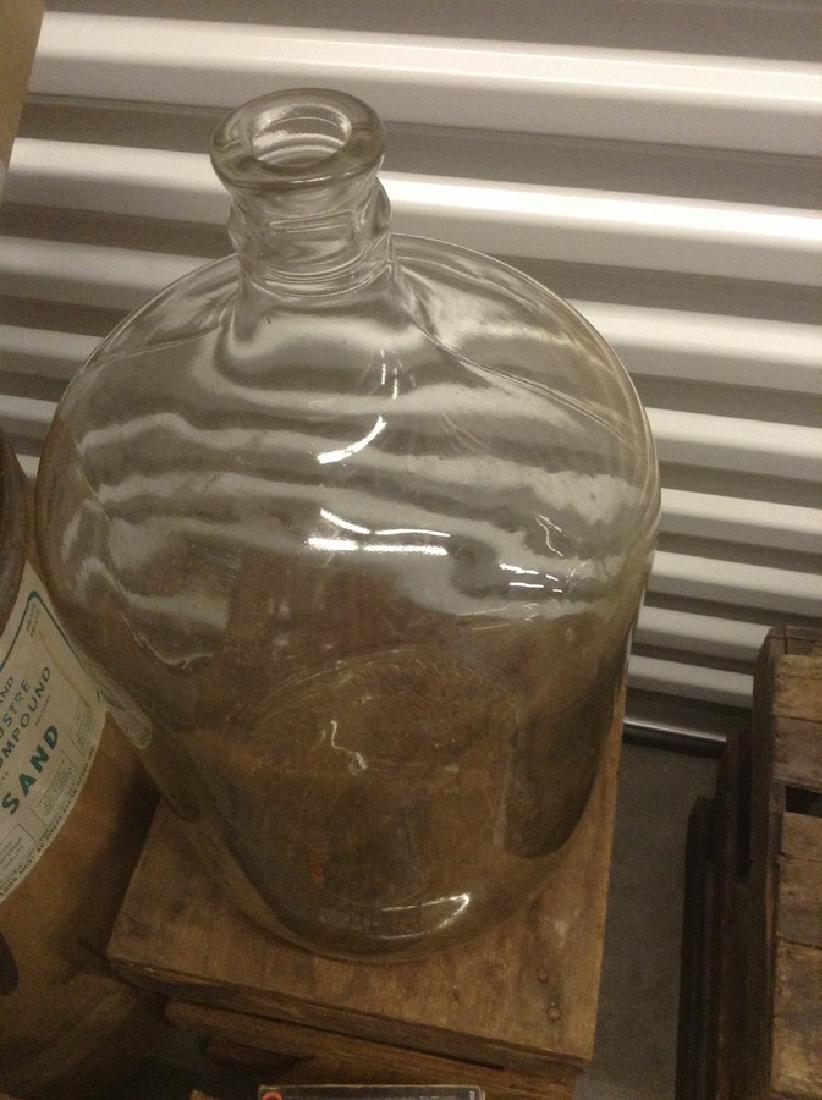 Clear glass 5 gallon water jug with crate: Clear glass 5 gallon water jug with crate