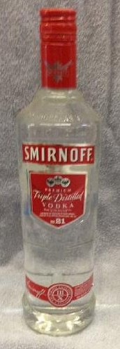 Smirnoff Vodka 750L Lab: Any contents in bottle is Free; You are bidding on the bottle & unbroken tax stamp