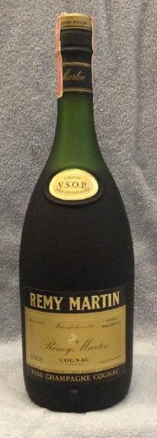 Remy Martin Cognac 750 ML: Any contents in bottle is Free; You are bidding on the bottle & unbroken tax stamp