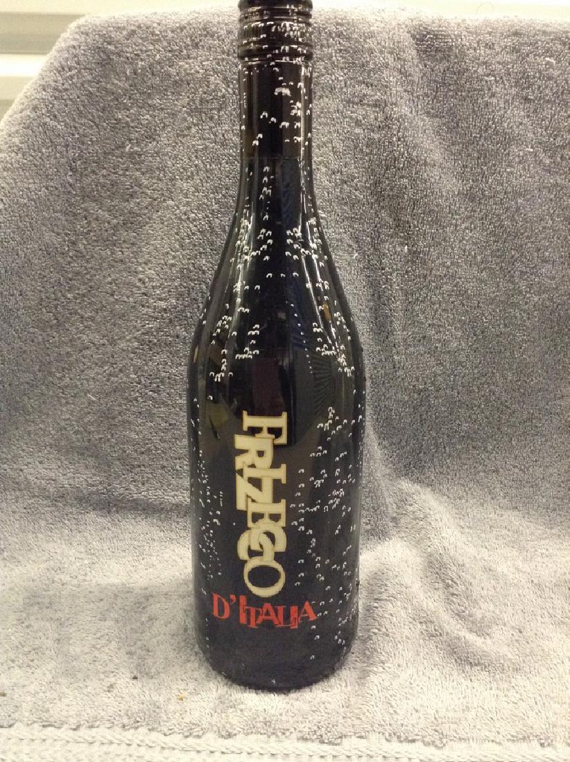 Frizecco D' Italia - 750ml: Any contents in bottle is Free; You are bidding on the bottle & unbroken tax stamp