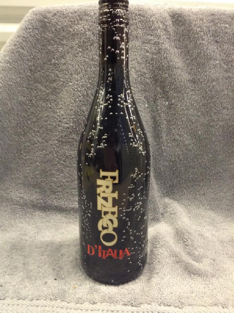 Frizecco D' Italia - 750ml: Any contents in bottle is Free; You are bidding on the bottle & unbroken tax stamp