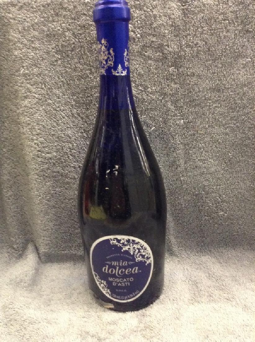 Mia Dolcea Moscato D'Asti 750ml: Any contents in bottle is Free; You are bidding on the bottle & unbroken tax stamp