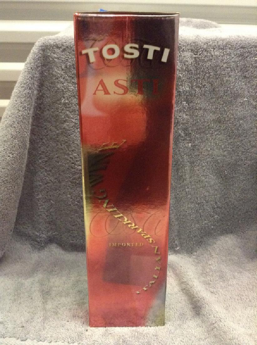 Tosti Asti - 750ml in box: Any contents in bottle is Free; You are bidding on the bottle & unbroken tax stamp