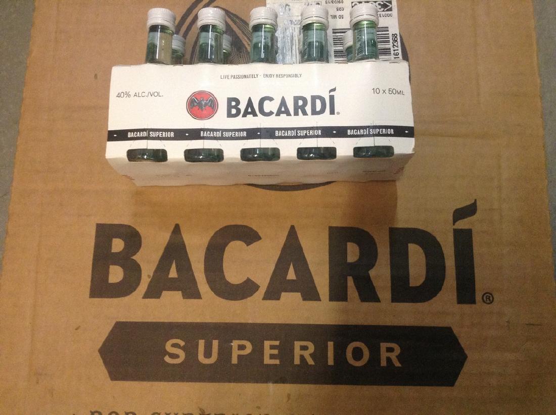 Bacardi Superior 10 mini bottles: Any contents in bottle is Free; You are bidding on the bottle & unbroken tax stamp