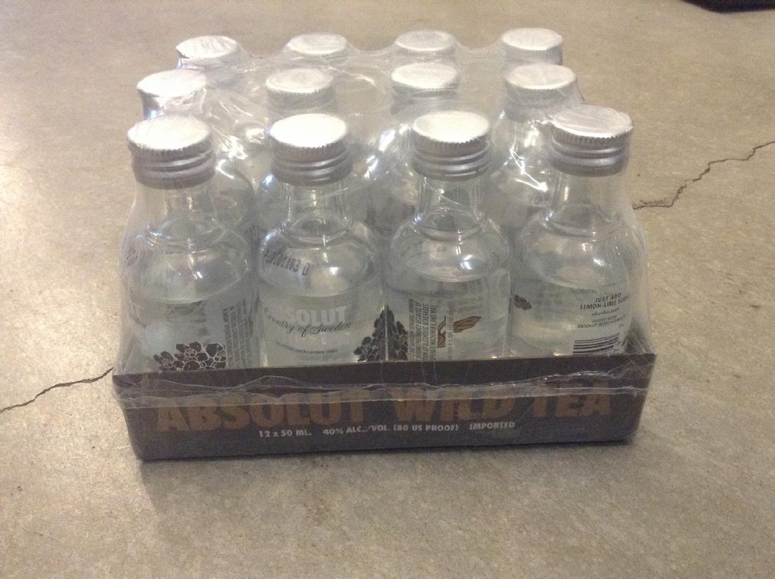 Absolute Wild Tea 12 mini bottles: Any contents in bottle is Free; You are bidding on the bottle & unbroken tax stamp