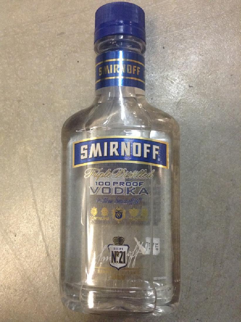 Smirnoff Triple Distilled Vodka 200ml: Any contents in bottle is Free; You are bidding on the bottle & unbroken tax stamp