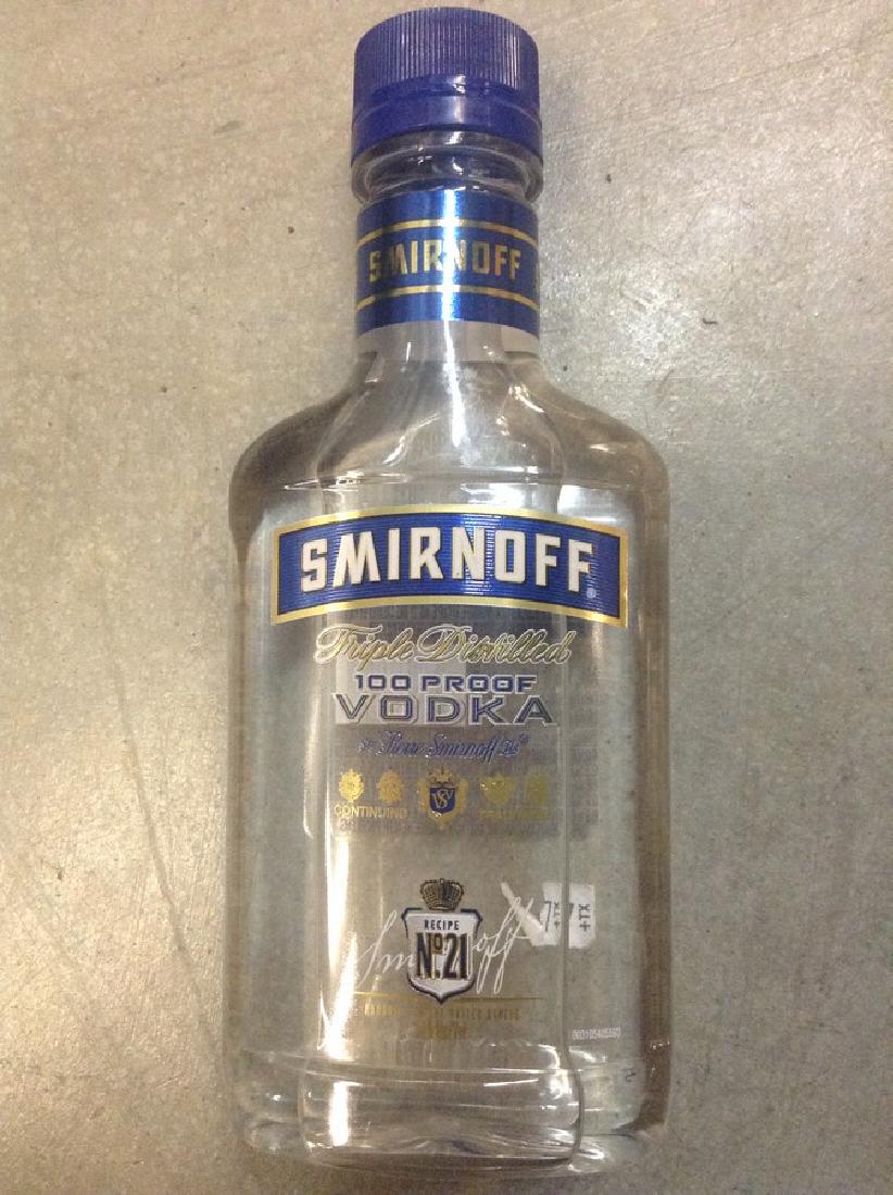 Smirnoff Triple Distilled Vodka 200ml: Any contents in bottle is Free; You are bidding on the bottle & unbroken tax stamp