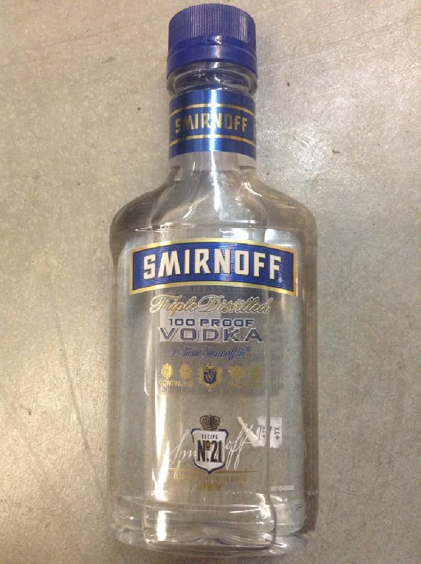 Smirnoff Triple Distilled Vodka 200ml: Any contents in bottle is Free; You are bidding on the bottle & unbroken tax stamp
