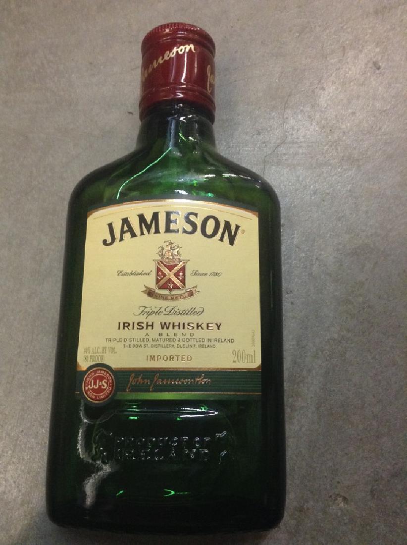 Jameson Irish Whiskey 200ml: Any contents in bottle is Free; You are bidding on the bottle & unbroken tax stamp