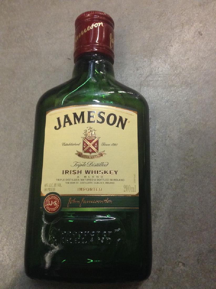 Jameson Irish Whiskey 200ml: Any contents in bottle is Free; You are bidding on the bottle & unbroken tax stamp