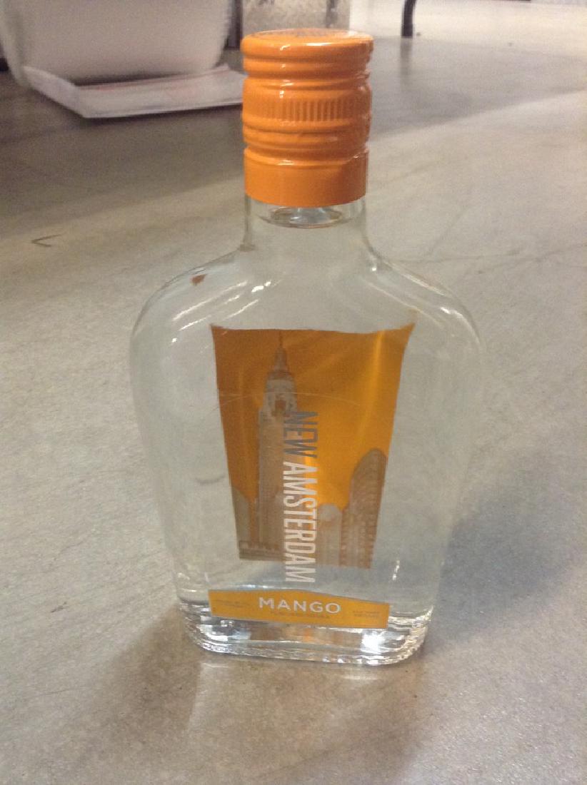 New Amsterdam Mango Vodka 375ml: Any contents in bottle is Free; You are bidding on the bottle & unbroken tax stamp