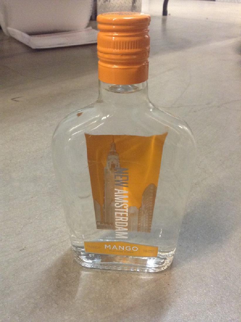 New Amsterdam Mango Vodka 375ml: Any contents in bottle is Free; You are bidding on the bottle & unbroken tax stamp