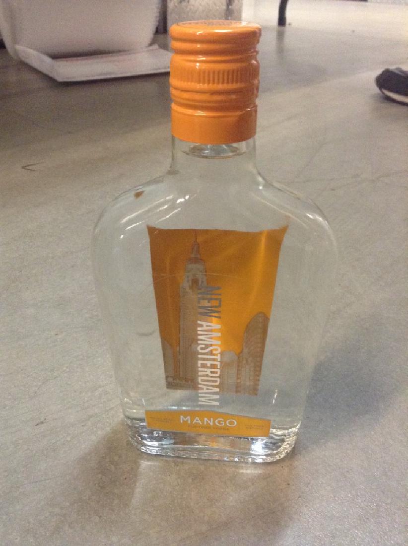 New Amsterdam Mango Vodka 375ml: Any contents in bottle is Free; You are bidding on the bottle & unbroken tax stamp