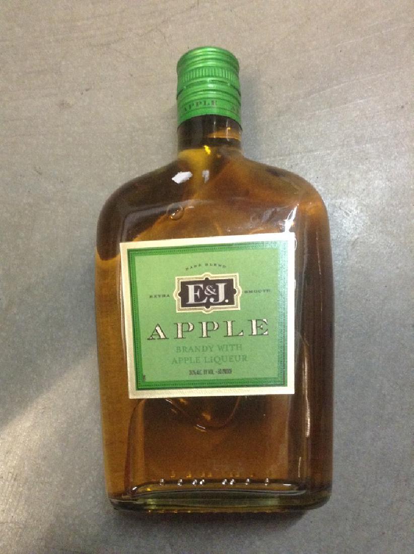 E & J Apple Brandy & Liquor 375ml: Any contents in bottle is Free; You are bidding on the bottle & unbroken tax stamp