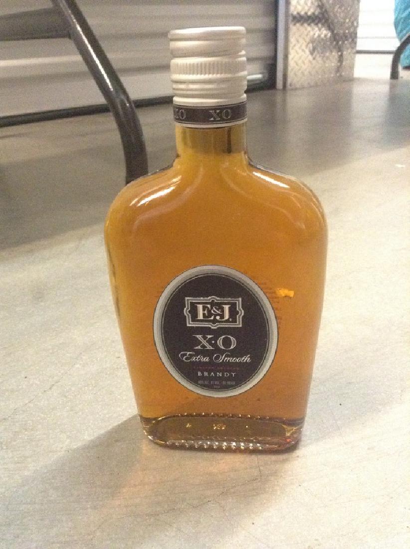 XO Smoth Brandy 375ml: Any contents in bottle is Free; You are bidding on the bottle & unbroken tax stamp
