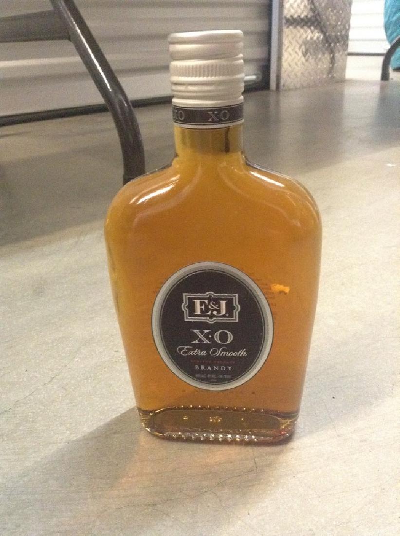 XO Smoth Brandy 375ml: Any contents in bottle is Free; You are bidding on the bottle & unbroken tax stamp