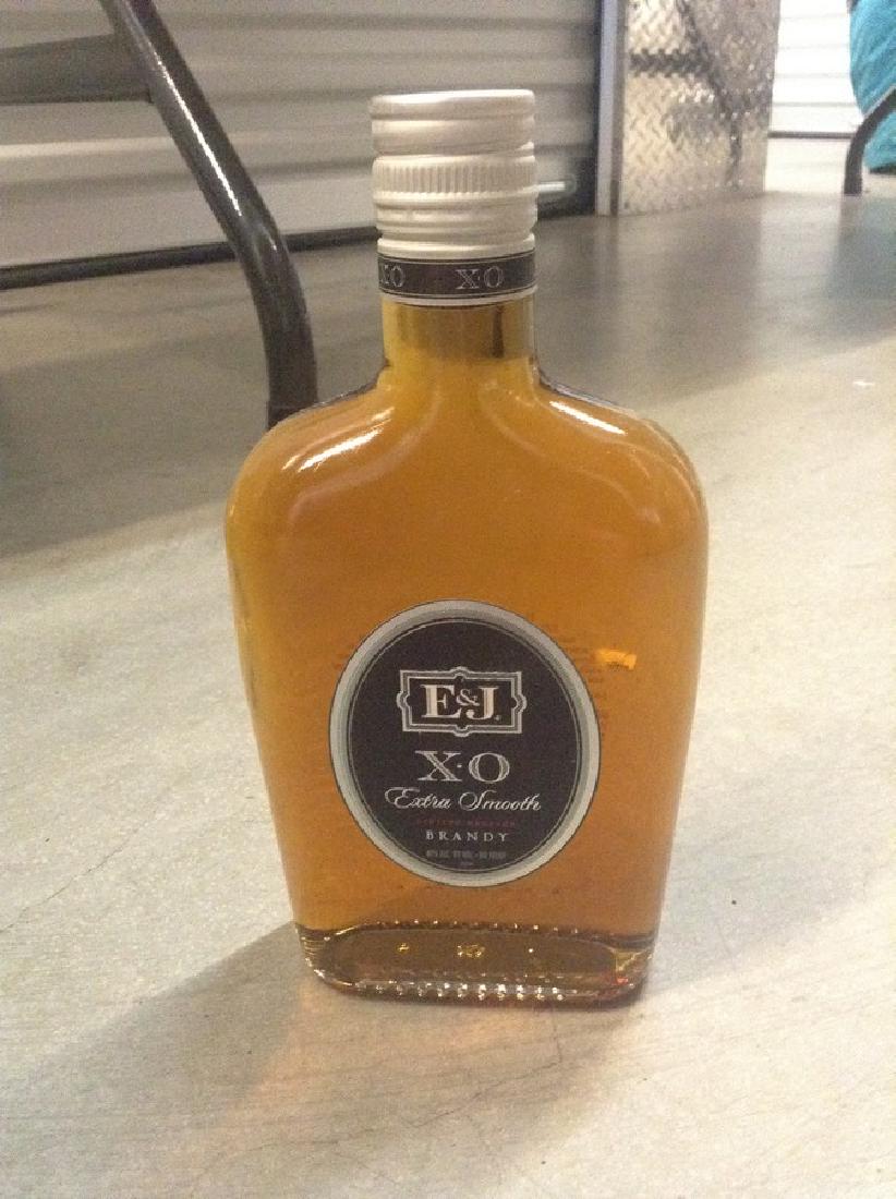 XO Smoth Brandy 375ml: Any contents in bottle is Free; You are bidding on the bottle & unbroken tax stamp