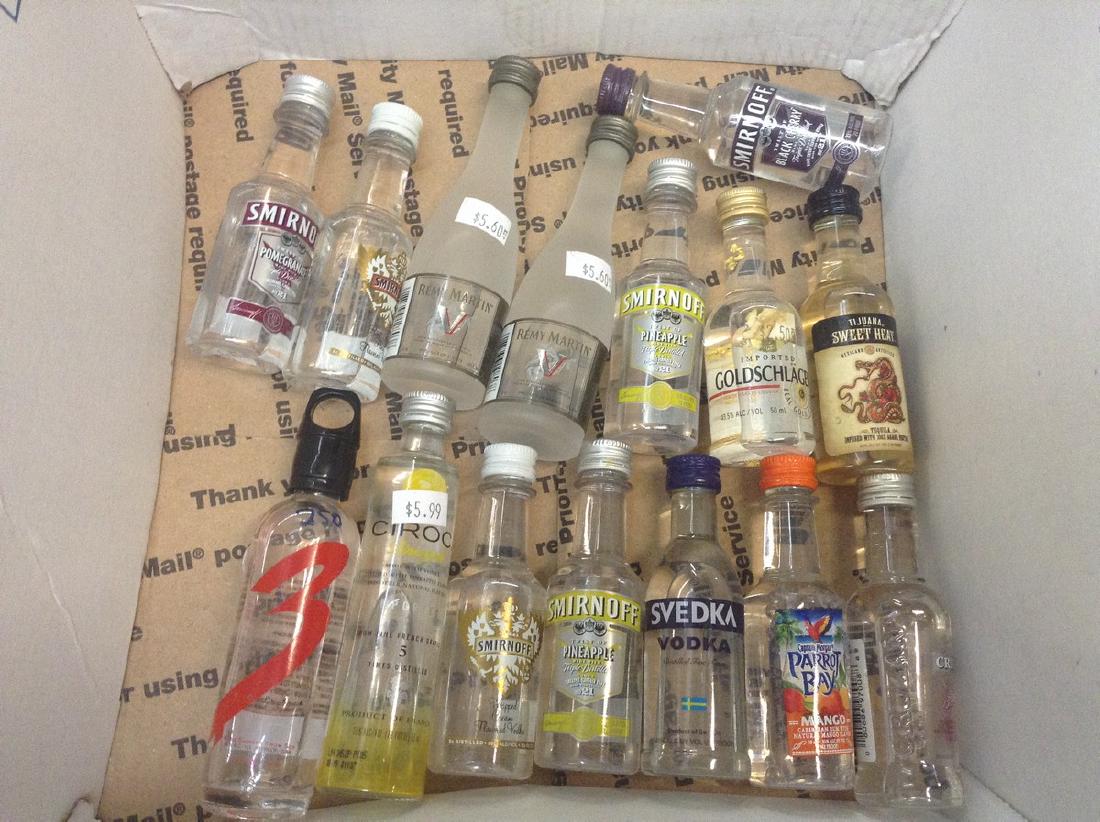 Lot of mini Liquor Bottles: Any contents in bottle is Free; You are bidding on the bottle & unbroken tax stamp