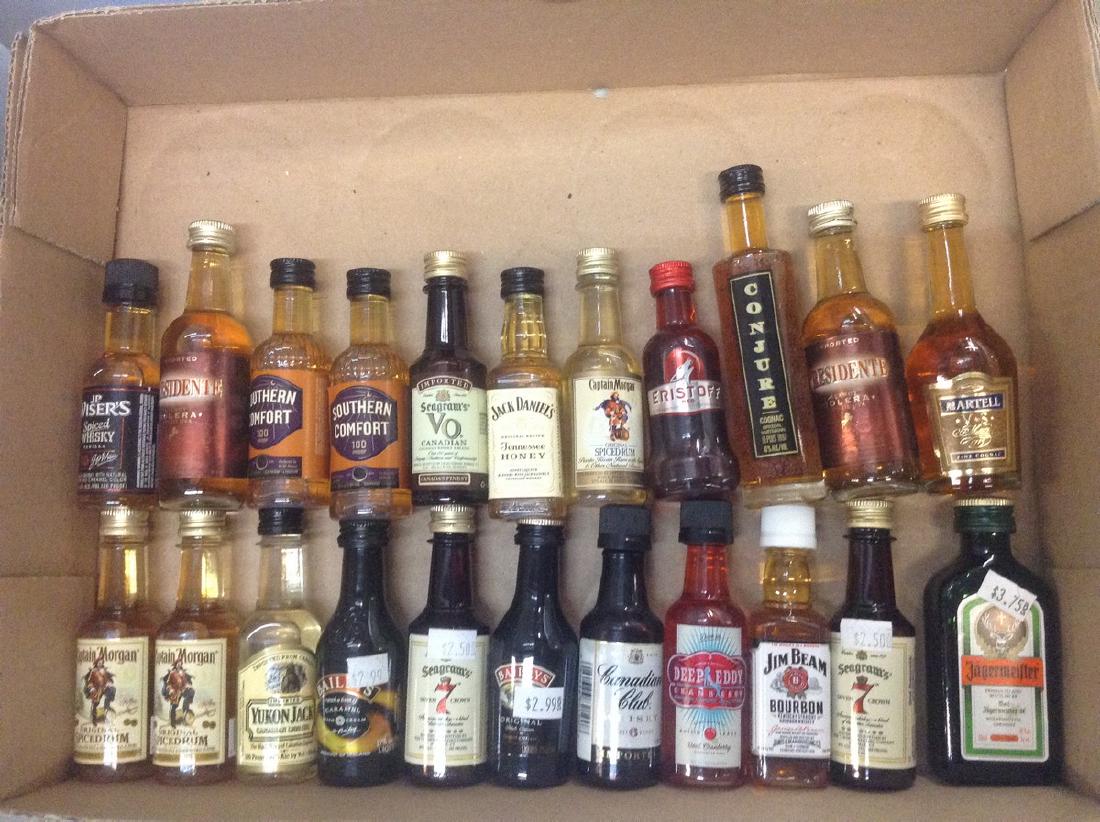 Lot of mini Liquor Bottles: Any contents in bottle is Free; You are bidding on the bottle & unbroken tax stamp
