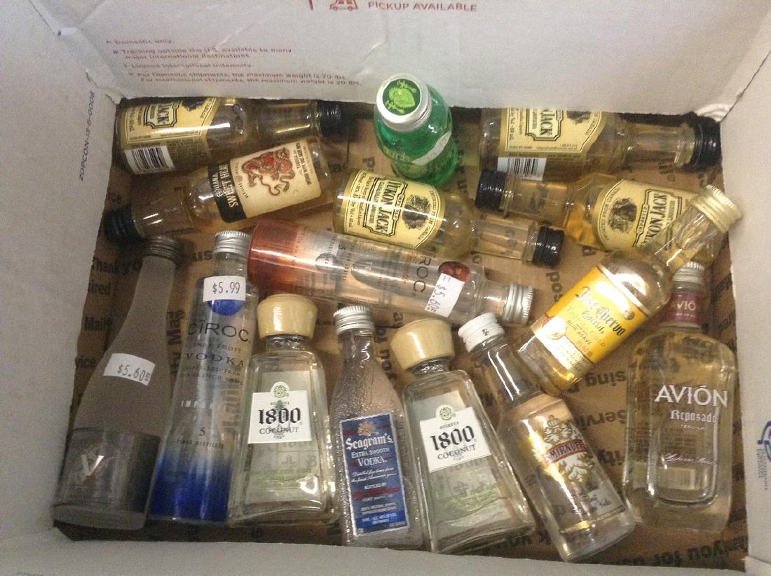 Lot of mini Liquor Bottles: Any contents in bottle is Free; You are bidding on the bottle & unbroken tax stamp