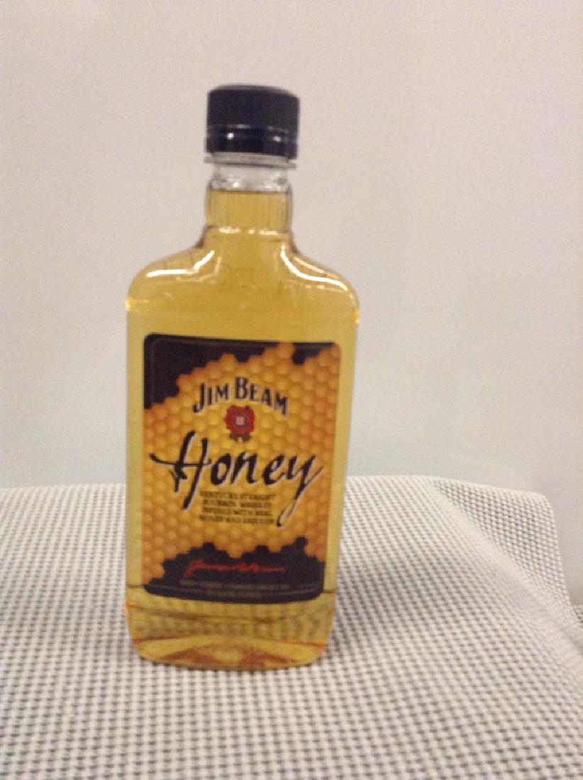 Jim Beam Honey: Any contents in bottle is Free; You are bidding on the bottle & unbroken tax stamp