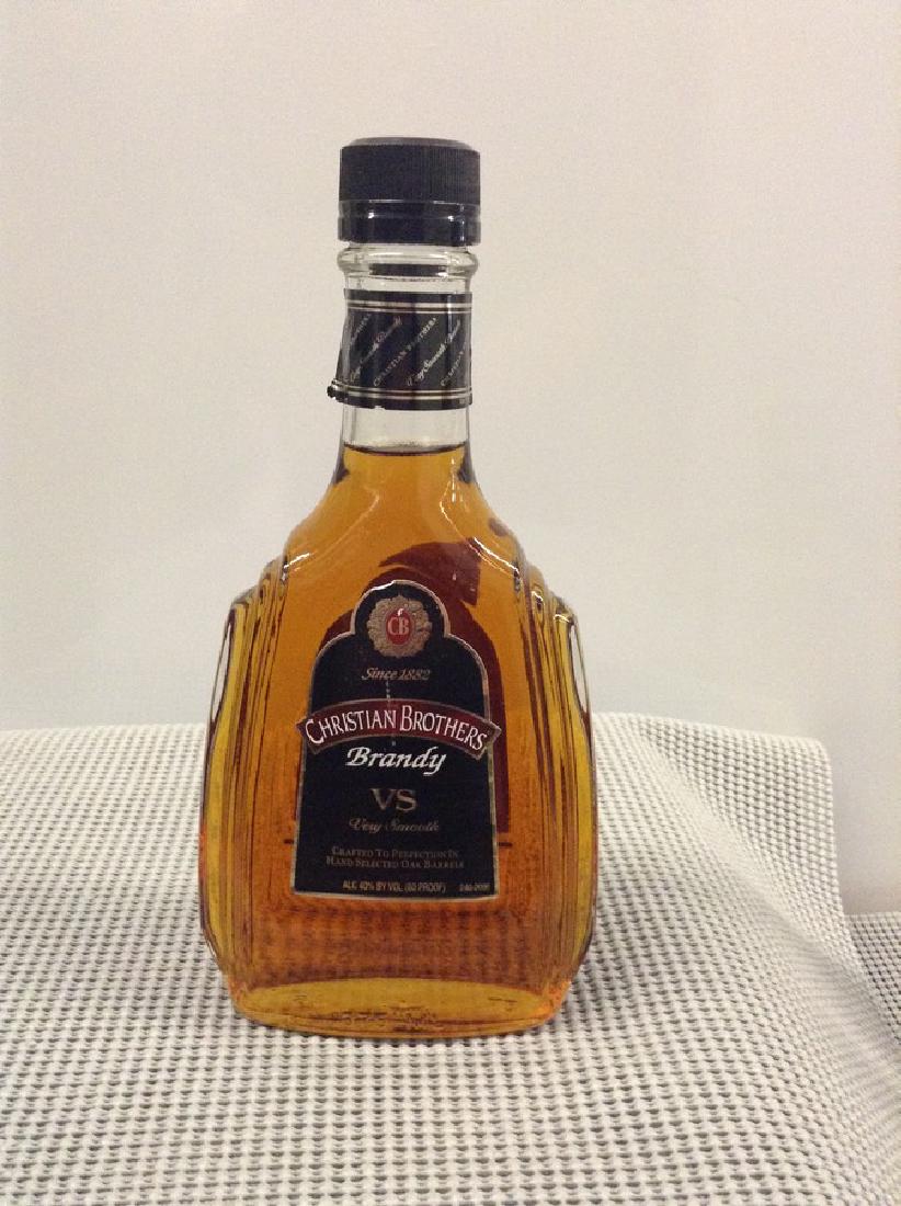 Christian Brothers Brandy: Any contents in bottle is Free; You are bidding on the bottle & unbroken tax stamp