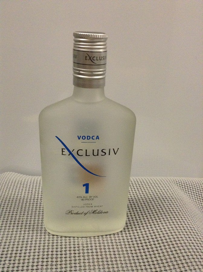 Exclusiv "Vodca" Vodka # 1 375: Any contents in bottle is Free; You are bidding on the bottle & unbroken tax stamp