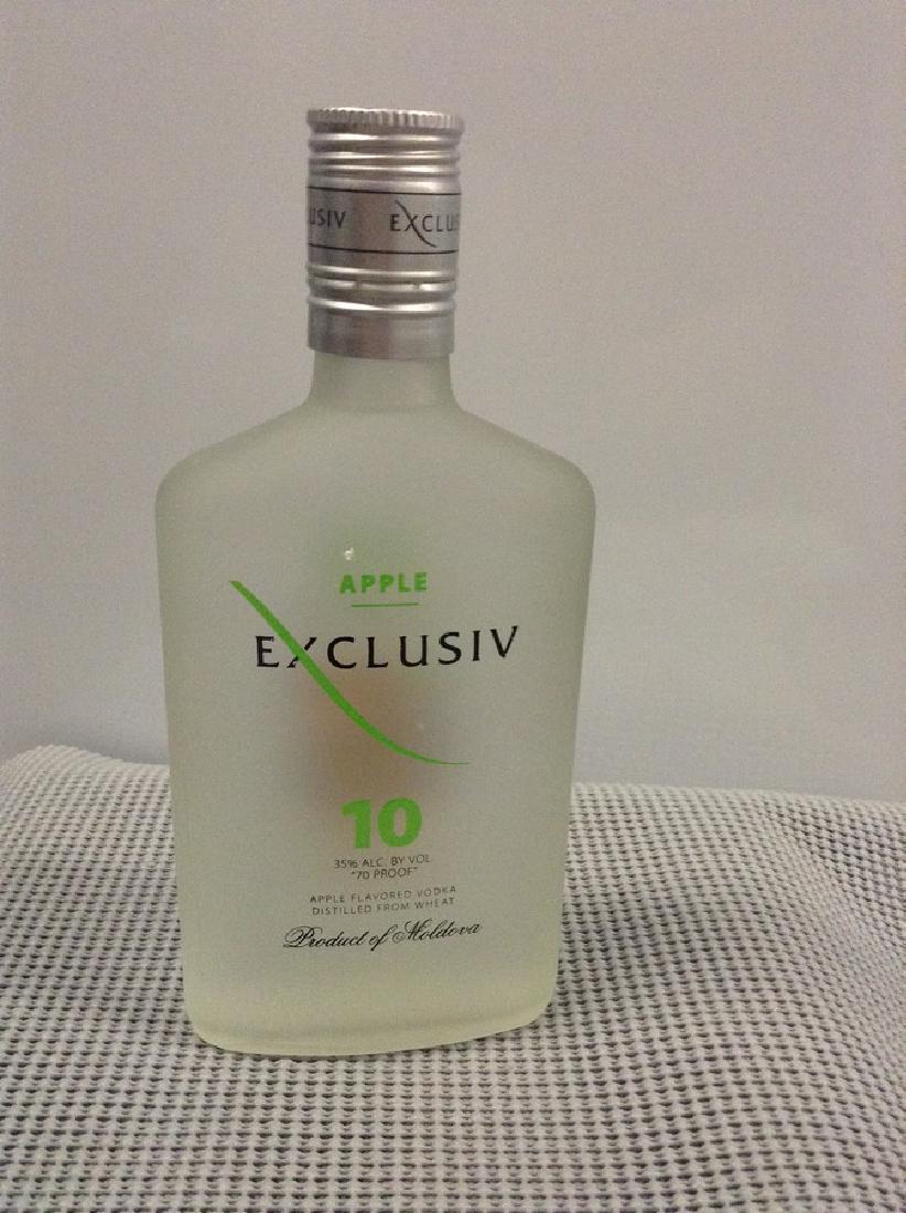 Exclusiv Apple Vodka # 10 375 ML: Any contents in bottle is Free; You are bidding on the bottle & unbroken tax stamp