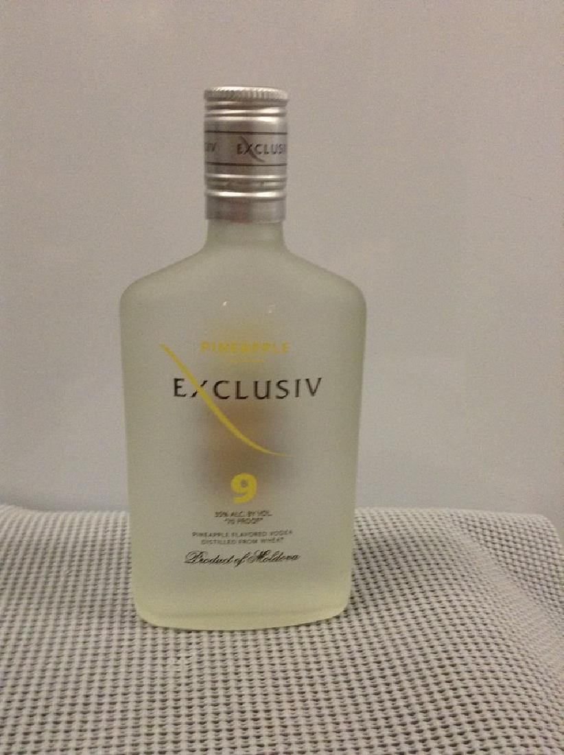 Exclusiv Pineapple Vodka #9 375Ml: Any contents in bottle is Free; You are bidding on the bottle & unbroken tax stamp