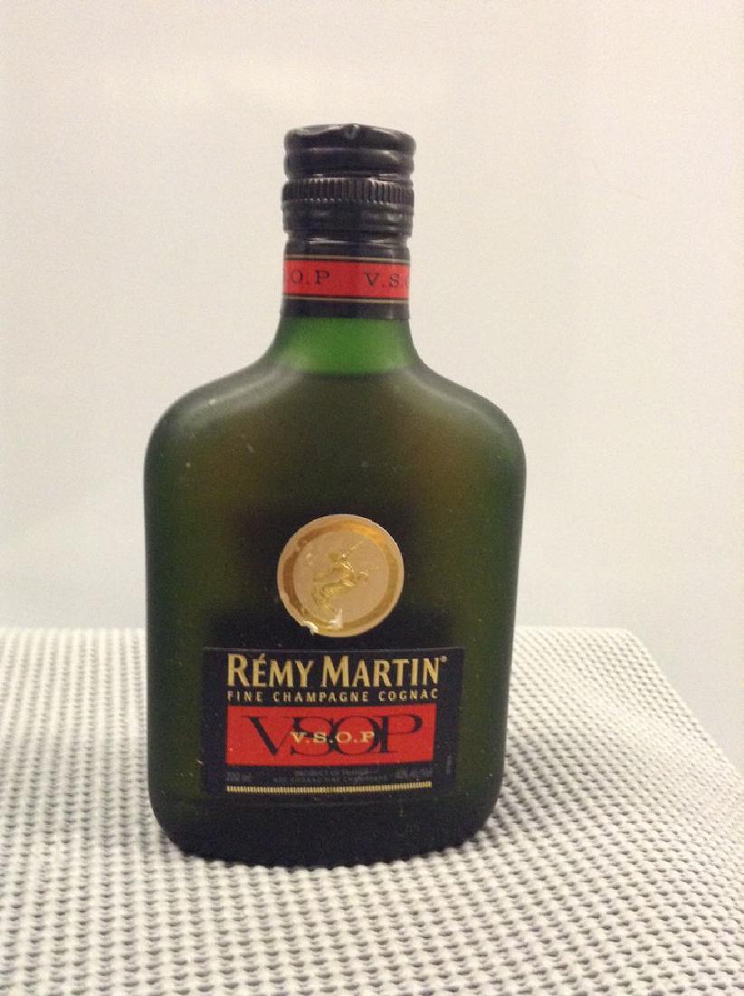 Remy Martin Champagne Cognac VSOP 200 ML: Any contents in bottle is Free; You are bidding on the bottle & unbroken tax stamp