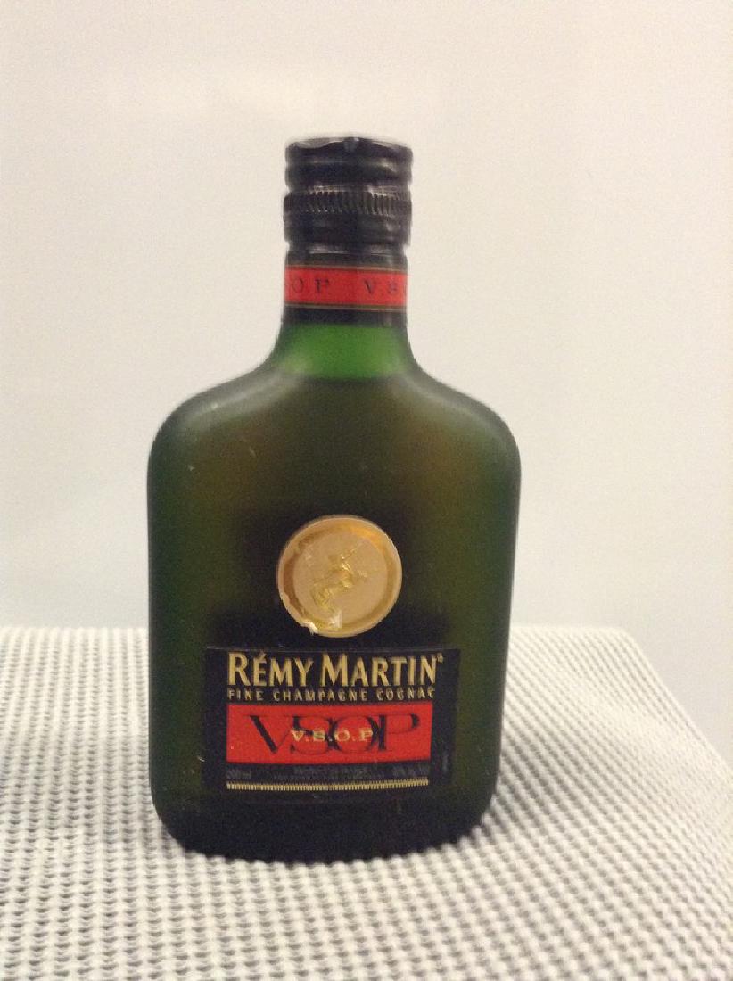 Remy Martin Champagne Cognac VSOP 200 ML: Any contents in bottle is Free; You are bidding on the bottle & unbroken tax stamp