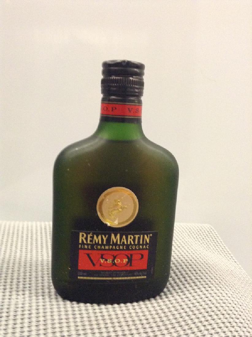 Remy Martin Champagne Cognac VSOP 200 ML: Any contents in bottle is Free; You are bidding on the bottle & unbroken tax stamp